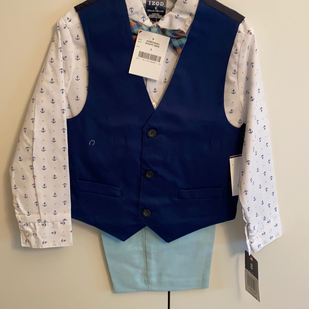 Vest, shorts, button down, and bow tie.